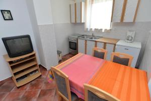 Kuchyň nebo kuchyňský kout v ubytování Apartments Slavica 590