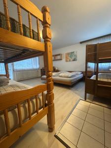 Voodi või voodid majutusasutuse Holiday House Lärchenheim toas