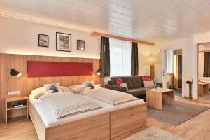 Postel nebo postele na pokoji v ubytování Haus Flexen rooms & apartments