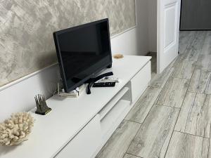 Μια τηλεόραση ή/και κέντρο ψυχαγωγίας στο Apartament de inchiriat