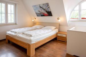 Postel nebo postele na pokoji v ubytování Ferienhaus Jaguar