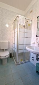 Koupelna v ubytování Hotel Tito