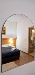 Postel nebo postele na pokoji v ubytování Hotel Tito + 37 fotografií