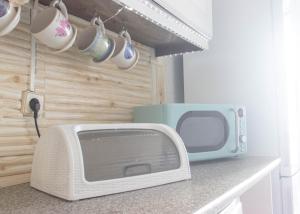 Kuchyň nebo kuchyňský kout v ubytování Alojamento Avenida da Praia - Almograve + 49 fotografií