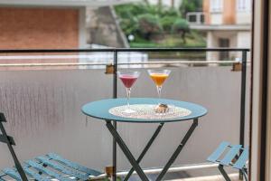 two drinks on a table on a balcony at YCH-Cozy Flat at the Vatican in Rome +45 photos