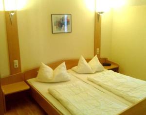 Giường trong phòng chung tại Wohnung In Bad Kötzting