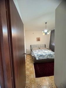 Postel nebo postele na pokoji v ubytování Casa C&S