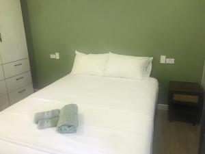 Letto o letti in una camera di Alec's Hotel