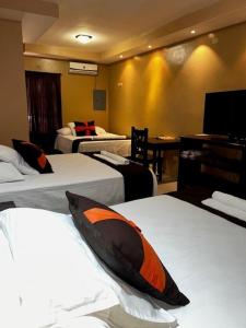 Postel nebo postele na pokoji v ubytování Hotel San Sebastian