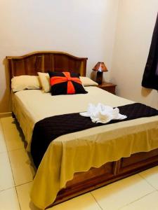 Ένα ή περισσότερα κρεβάτια σε δωμάτιο στο Hotel San Sebastian