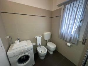 Kúpeľňa v ubytovaní Residence Antares - Agenzia Cocal