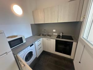 Kuchyňa alebo kuchynka v ubytovaní Residence Antares - Agenzia Cocal