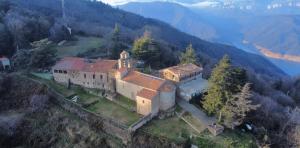 an aerial view of a house on a mountain at Rectoria Santuari del Coll in Girona