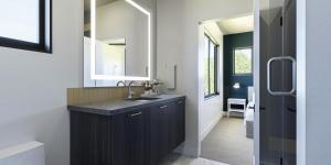 a bathroom with a sink and a mirror at Montclair at Zion in Springdale