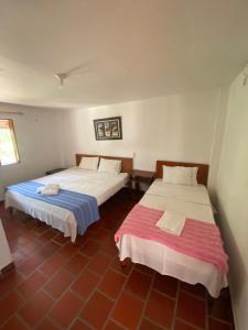Hotel Davilejas客房内的一张或多张床位