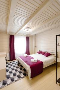 a bedroom with a large bed in a room at Вілла у горах in Krasnik +28 photos