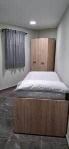 Postel nebo postele na pokoji v ubytování Apartamentos solymar oropesa del mar