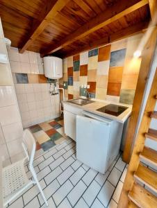 a small kitchen with a sink and a sink at Studio in Hyper Centre Close to All Amenities in Grenoble +5 photos
