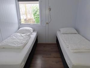 Katil atau katil-katil dalam bilik di Molkenbos Terschelling