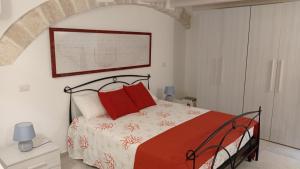Postel nebo postele na pokoji v ubytování Bufi de Nichilo locazione turistica occ.