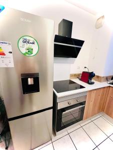 Dapur atau dapur kecil di Le MAËL - Grand T1 avec vue