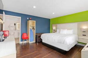 Signature Inn Berkeley客房内的一张或多张床位