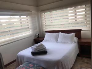 Postel nebo postele na pokoji v ubytování hotel el portal de las Flores, Alojamiento Rural