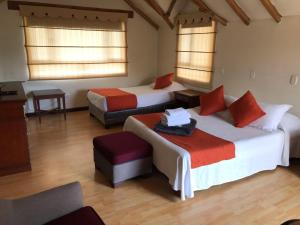 Postel nebo postele na pokoji v ubytování hotel el portal de las Flores, Alojamiento Rural