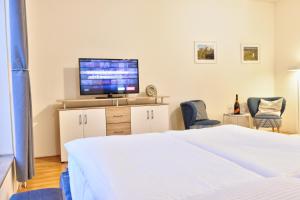 Postel nebo postele na pokoji v ubytování Karlsbad Apartment
