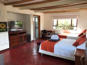 Postel nebo postele na pokoji v ubytování hotel el portal de las Flores, Alojamiento Rural