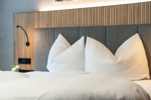 Posteľ alebo postele v izbe v ubytovaní Hotel Garni Madrisa