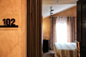 Postel nebo postele na pokoji v ubytování Hotel Labiatan