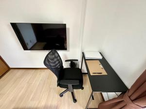 TV a/nebo společenská místnost v ubytování Apartment Hotel Kuki
