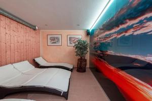 Posteľ alebo postele v izbe v ubytovaní Hotel Garni Madrisa