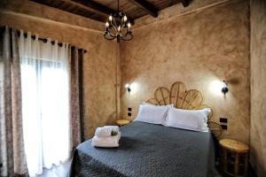 Postel nebo postele na pokoji v ubytování Hotel Labiatan