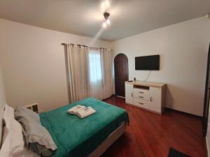 Katil atau katil-katil dalam bilik di Suite FIRST CLASS - tripla