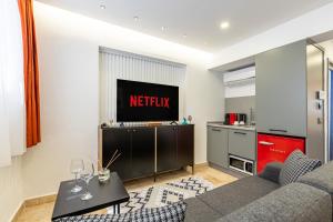a living room with a couch and a kitchen at BAB - by Menar Hotel in Istanbul