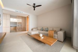 Posezení v ubytování Amaranto Bacalar Hotel Boutique