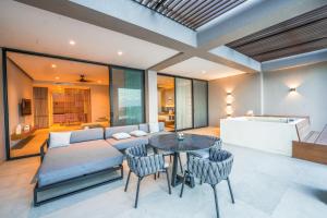 Posezení v ubytování Amaranto Bacalar Hotel Boutique
