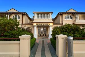 a large house with a gate in front of it at Palais Royale in Katoomba