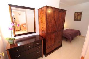 Ένα ή περισσότερα κρεβάτια σε δωμάτιο στο Moderne Ferienwohnung Colibri Mit Terrasse