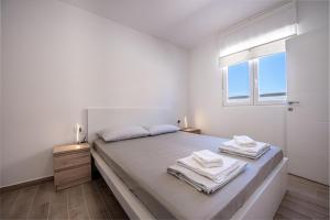 Postel nebo postele na pokoji v ubytování Villa Stocozzi + 32 fotografií