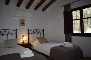 Posteľ alebo postele v izbe v ubytovaní Finca Ventorillo Mit Privatem Pool + 8 fotografií