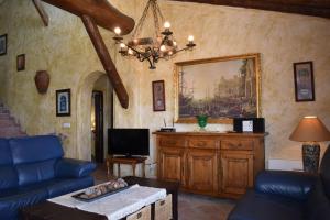 Televízia a/alebo spoločenská miestnosť v ubytovaní Finca Ventorillo Mit Privatem Pool