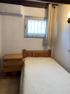 Posteľ alebo postele v izbe v ubytovaní Résidence Héliovillage - Villa 3 pers. T2 Cap d'Agde MAE-2864 + 1 fotografia