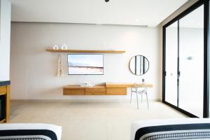 Posezení v ubytování Amaranto Bacalar Hotel Boutique