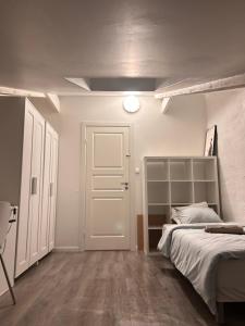 Postel nebo postele na pokoji v ubytování Single-bed rooms in Central located apartment in Trondheim
