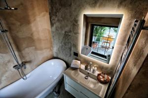Koupelna v ubytování Hotel Labiatan