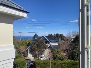 a view from the window of a house at Miles Town in Ito