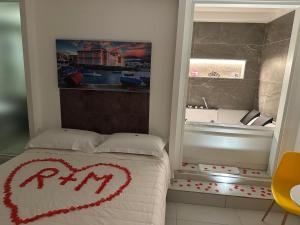 Ένα ή περισσότερα κρεβάτια σε δωμάτιο στο Wal49 Suite